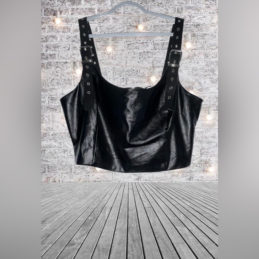 Forever 21 Faux leather crop top with buckle straps and zip backing.